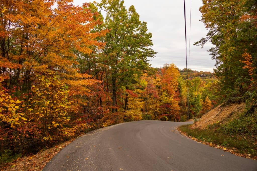 Scenic fall drive through Smoky Mountains on a Dolly Parton road trip.