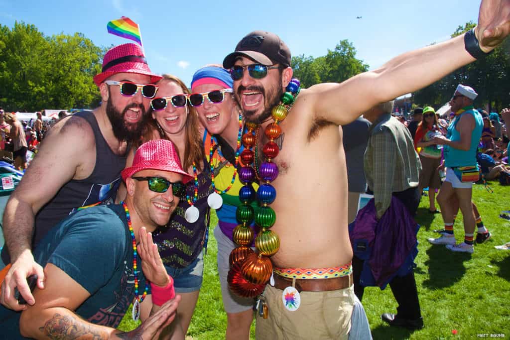 Group of LGBTQ+ members enjoying a gay pride celebration
