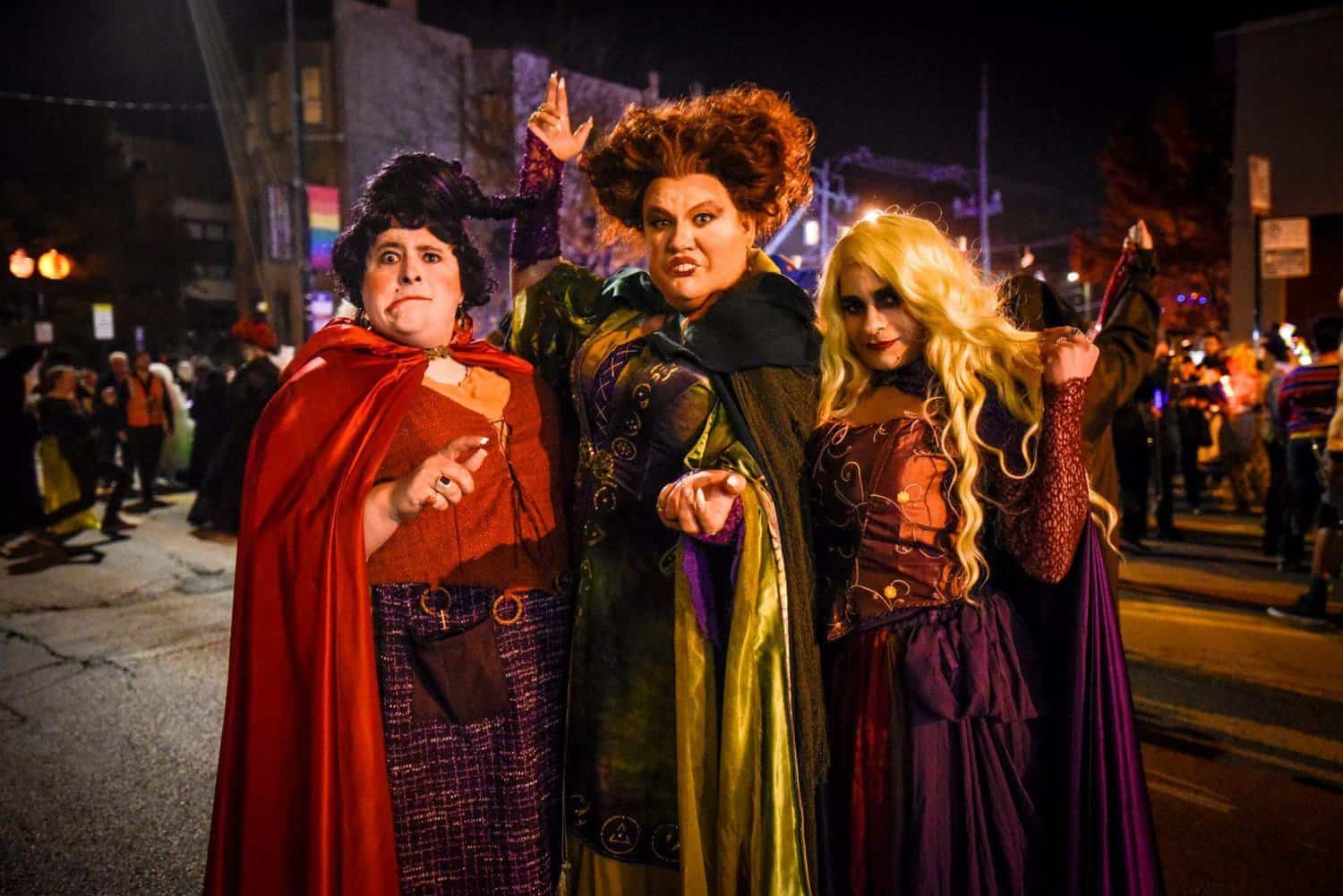 Three men dressed as the Sanderson Sisters from Hocus Pocus for the Haunted Halsted Halloween Parade in Chicago