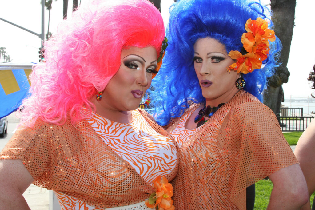 Colorful drag queens performing at Long Beach Pride, celebrating diversity and inclusion in spring LGBTQ+ pride events.