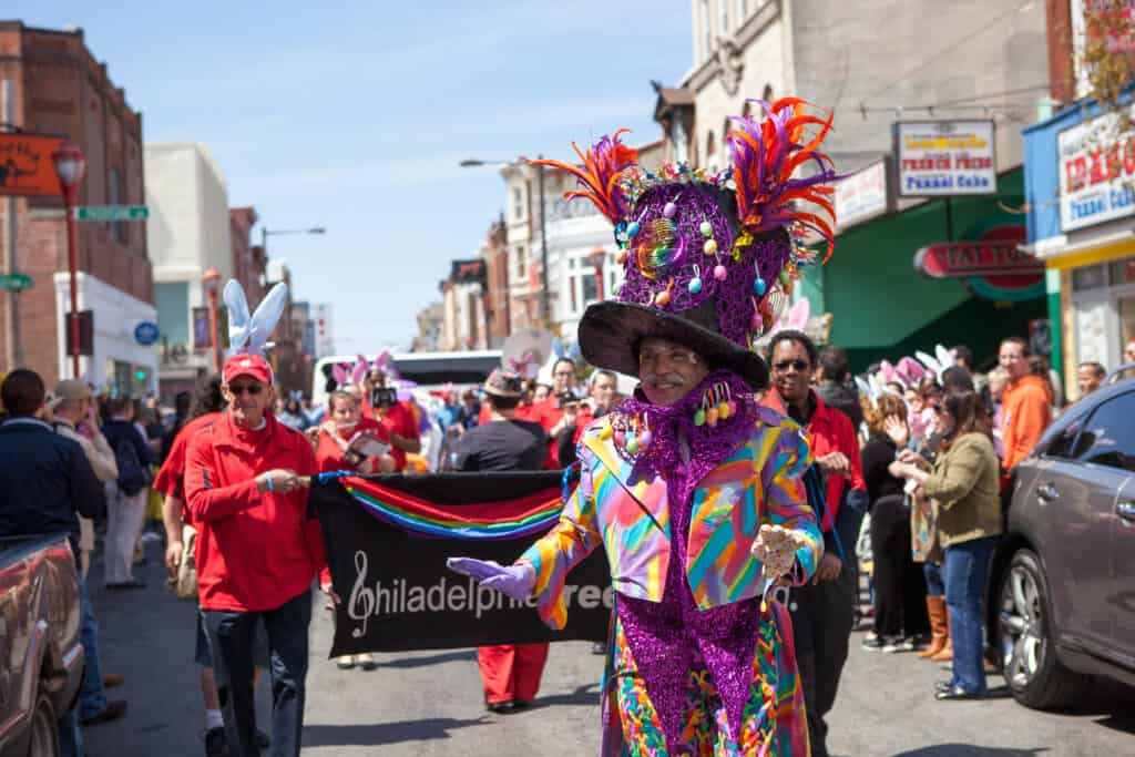 Henri David leading the Easter Promenade in Philadelphia, a festive event celebrating LGBTQ+ culture during Easter in a gay-friendly destination.