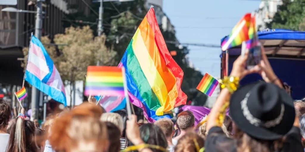 Spectators joyfully celebrating at Roanoke Pride parade, highlighting diversity and inclusion in spring LGBTQ+ pride events.